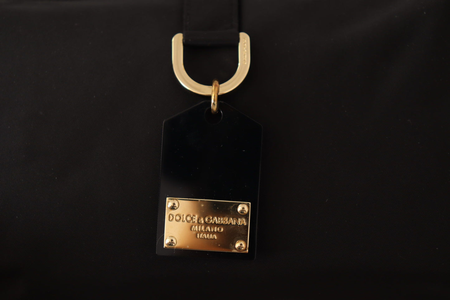 Elegant Black Belt Bag with Gold-Tone Appliqué