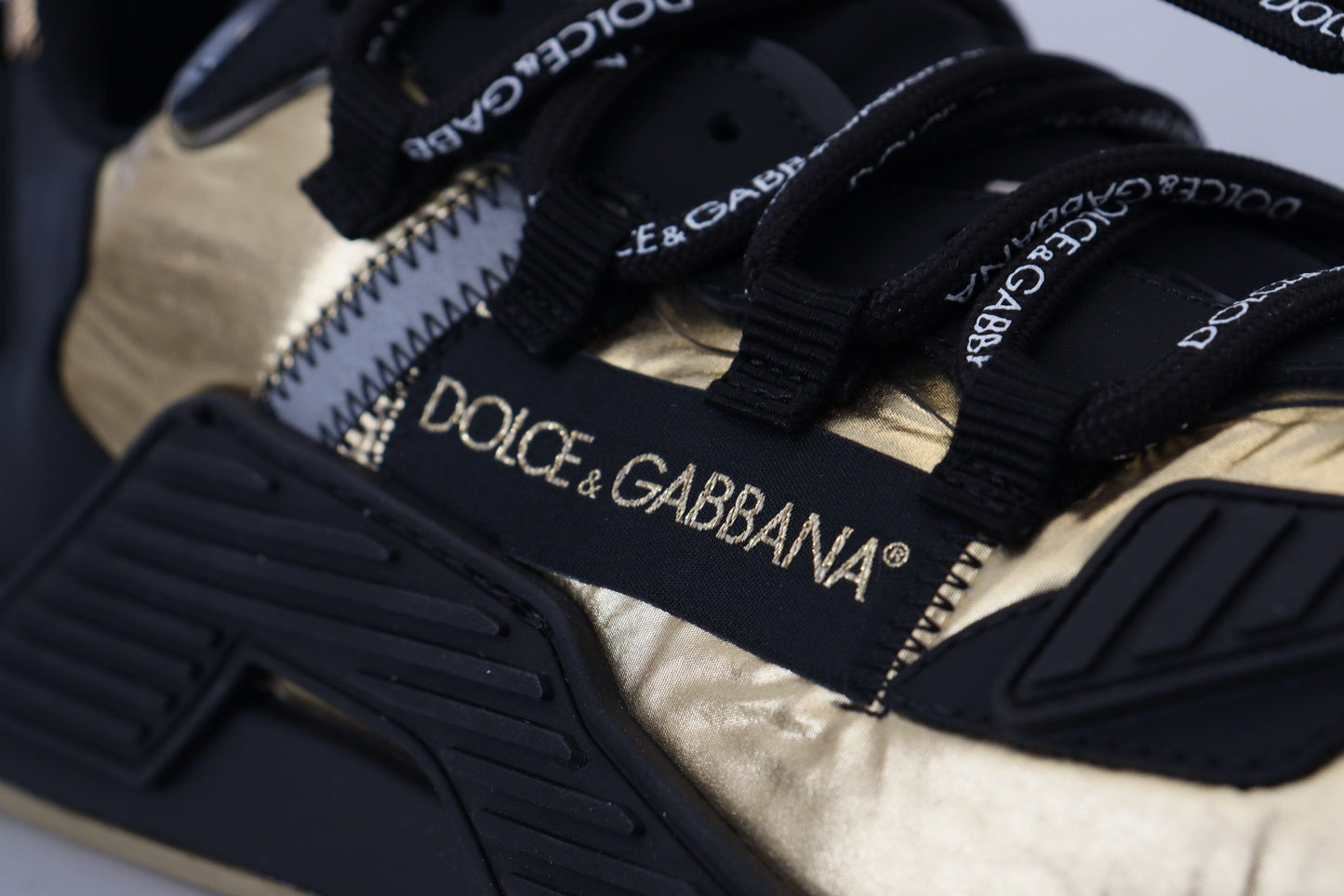 Elegant Black and Gold NS1 Sneakers