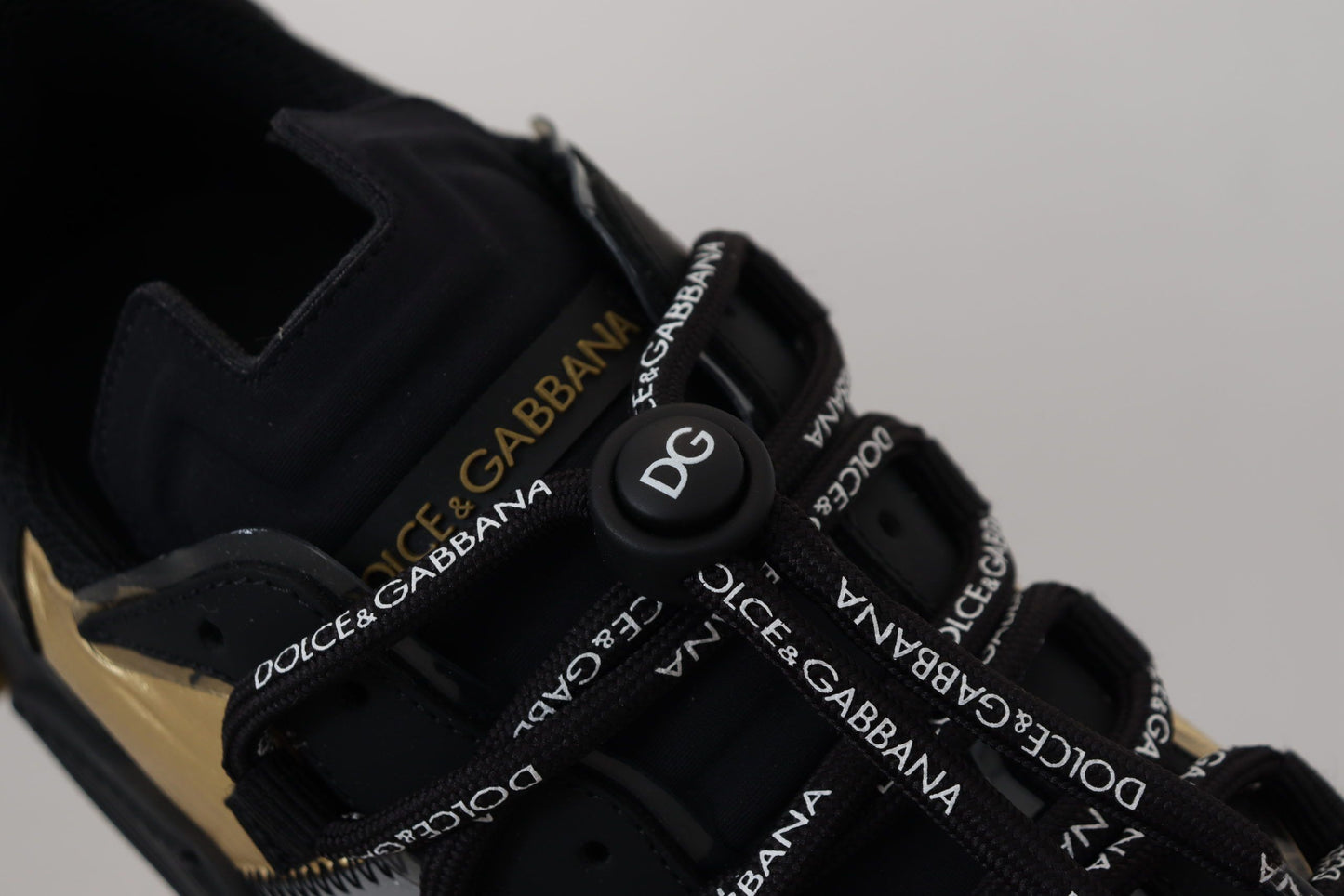 Elegant Black and Gold NS1 Sneakers
