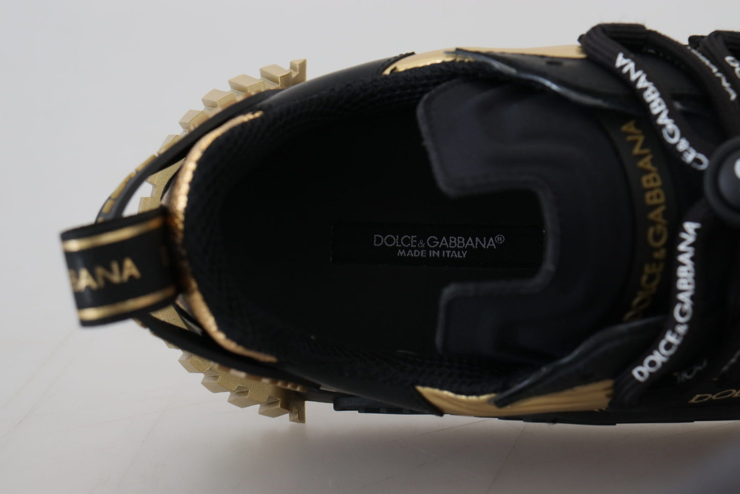 Elegant Black and Gold NS1 Sneakers