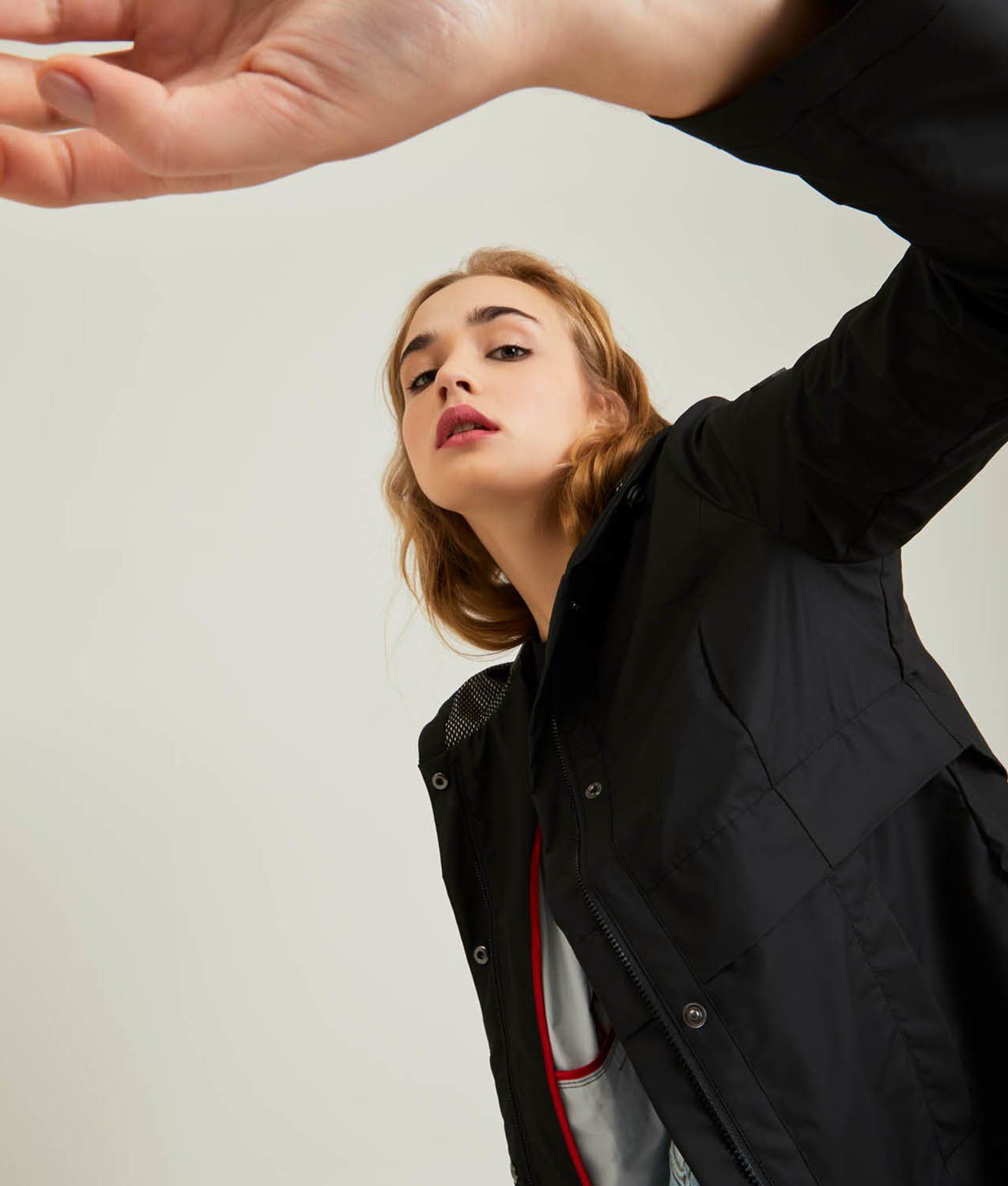 Sleek Black Polyester Jacket for the Modern Woman
