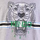 Elevate Your Style with an Iconic Tiger Print Tee