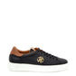 Sleek Black Leather Sneakers with Gold Accents