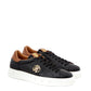 Sleek Black Leather Sneakers with Gold Accents
