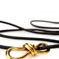 Elegant Black Leather Belt with Gold Accent