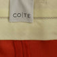 Orange boyfriend stretch pants