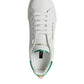 Chic White Sneakers with Green Heel Accent
