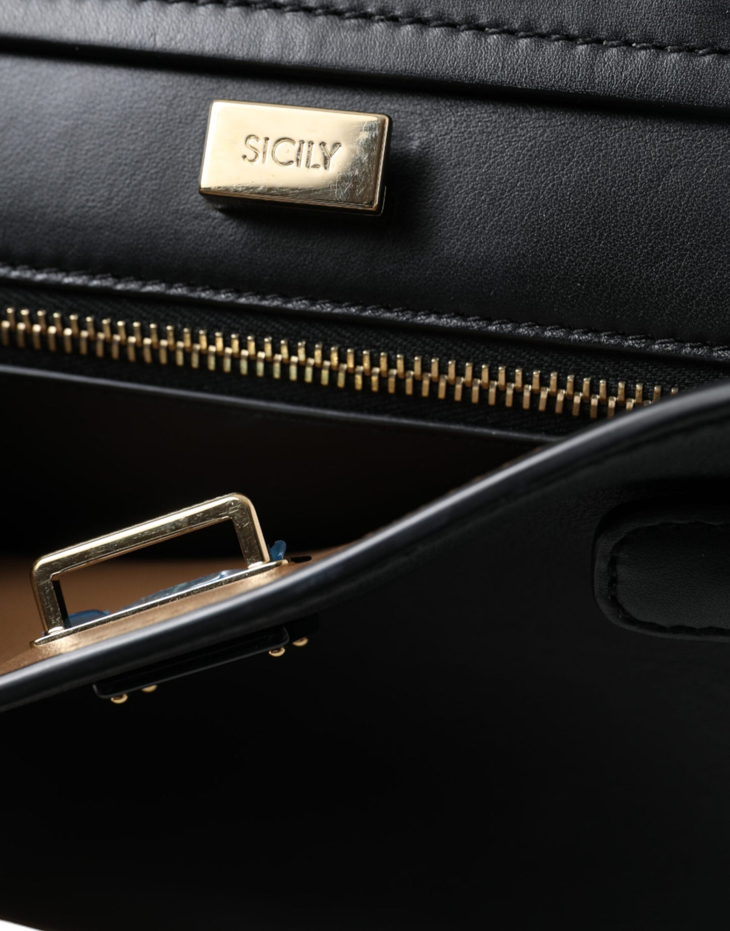 Elegant Black Leather Shoulder Bag with Gold Detailing