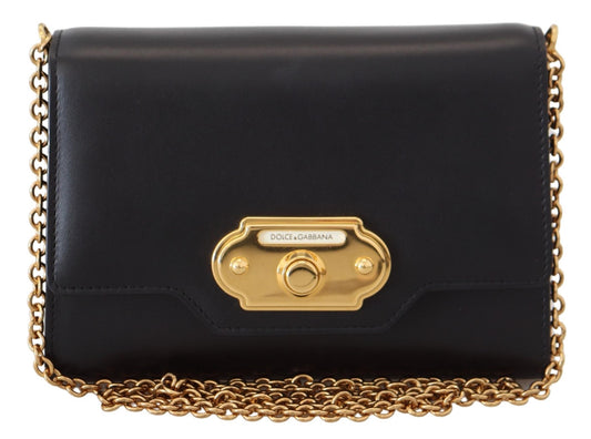 Chic Black Leather Shoulder Bag with Gold Detailing