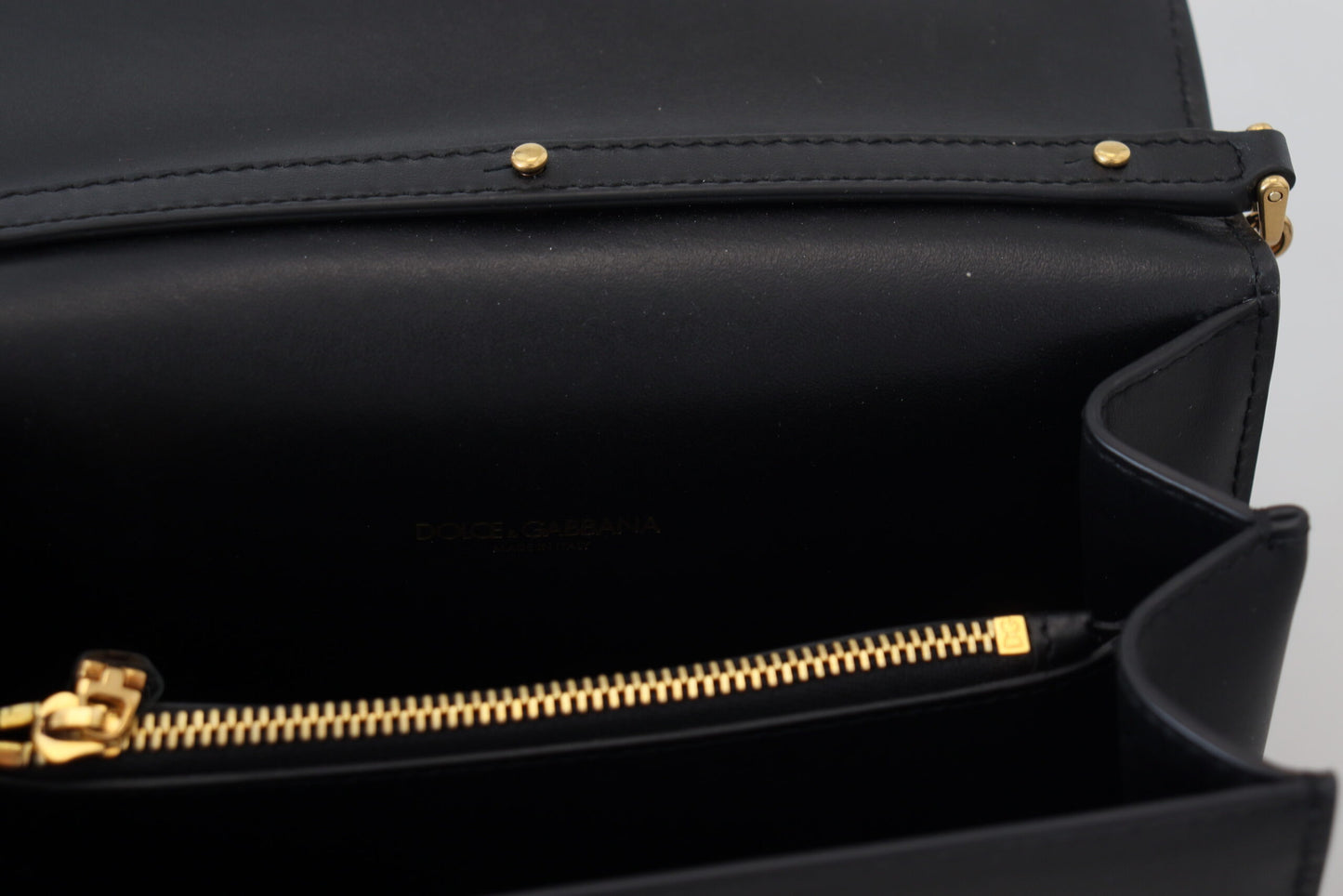 Chic Black Leather Shoulder Bag with Gold Detailing