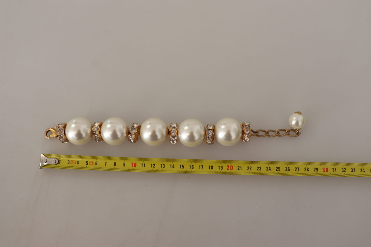 Opulent Gold Tone Bracelet with Crystals and Pearls