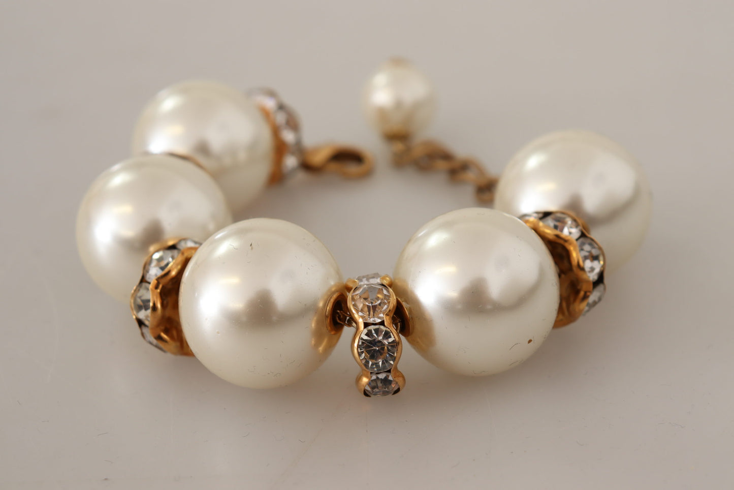 Opulent Gold Tone Bracelet with Crystals and Pearls