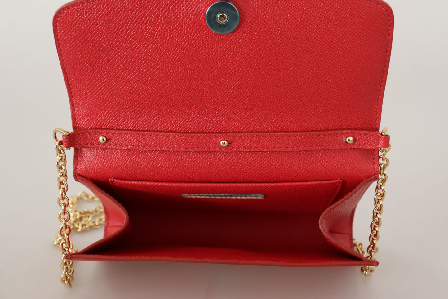 Elegant Red Leather Shoulder Bag with Gold Details