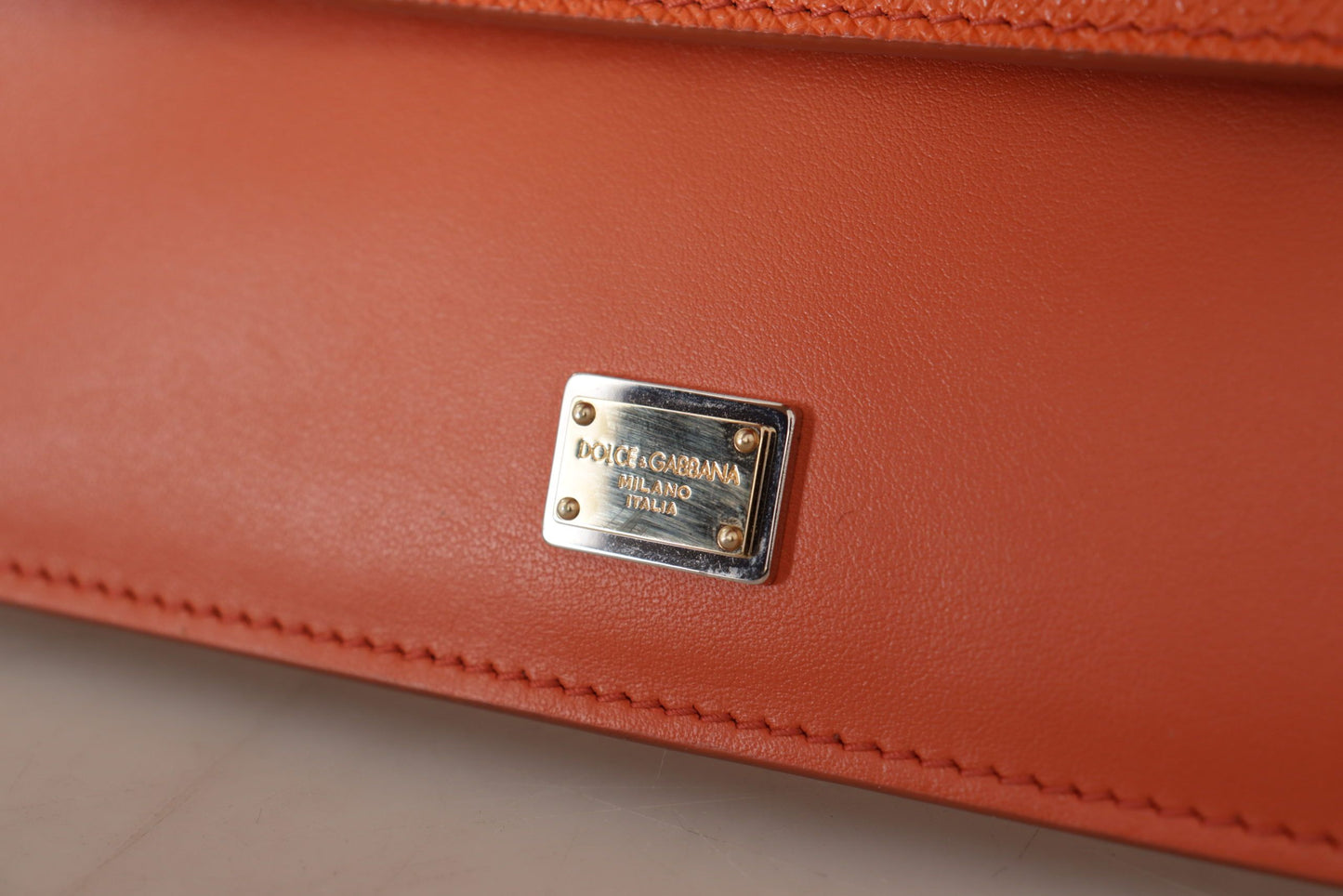 Exquisite Orange Leather Clutch with Gold Accents