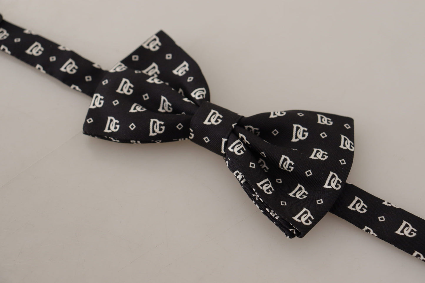 Elegant Silk Bow Tie in Black Logo Pattern