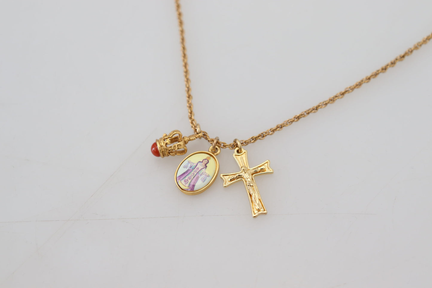 Elegant Gold Tone Charm Necklace with Cross Pendant