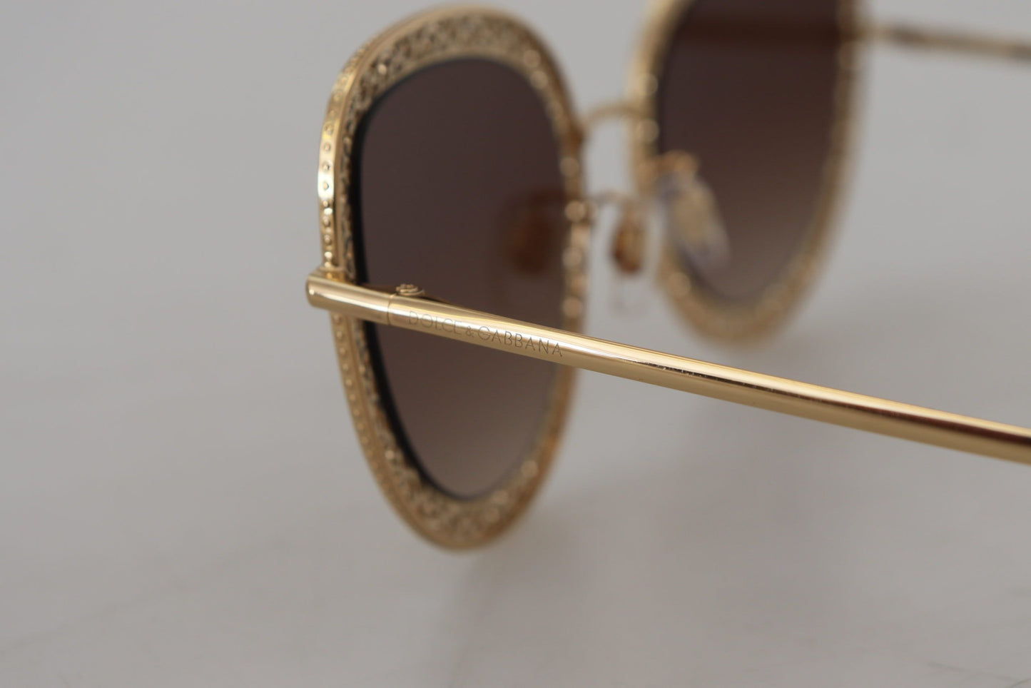 Elegant Lace-Patterned Gold Sunglasses