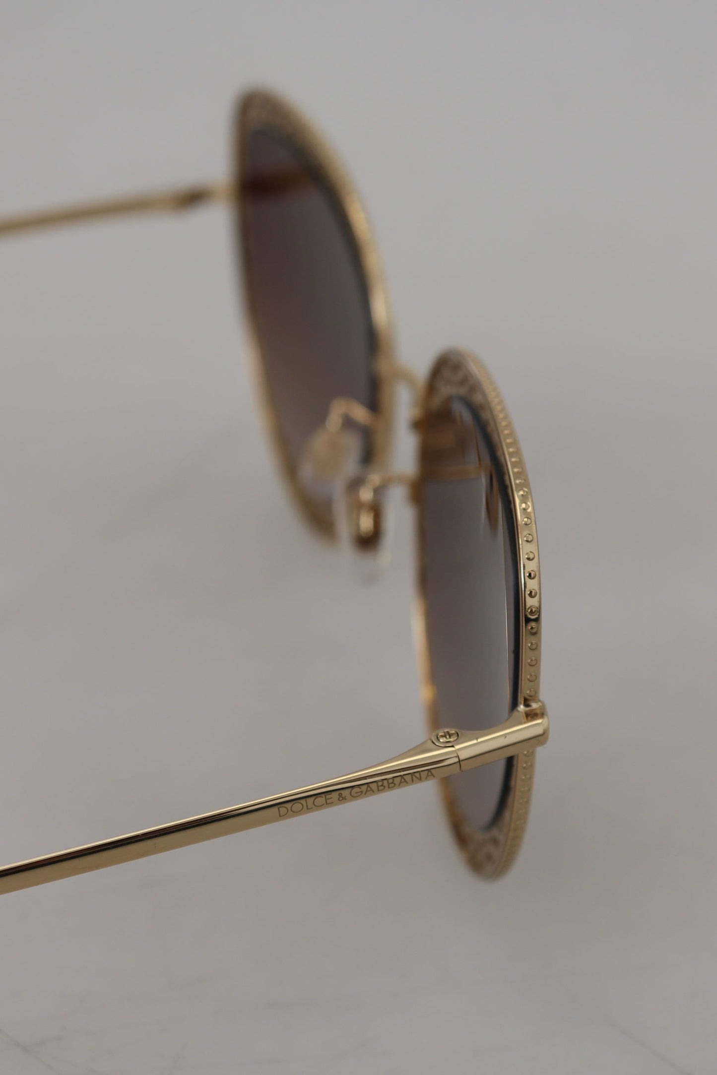 Elegant Lace-Patterned Gold Sunglasses