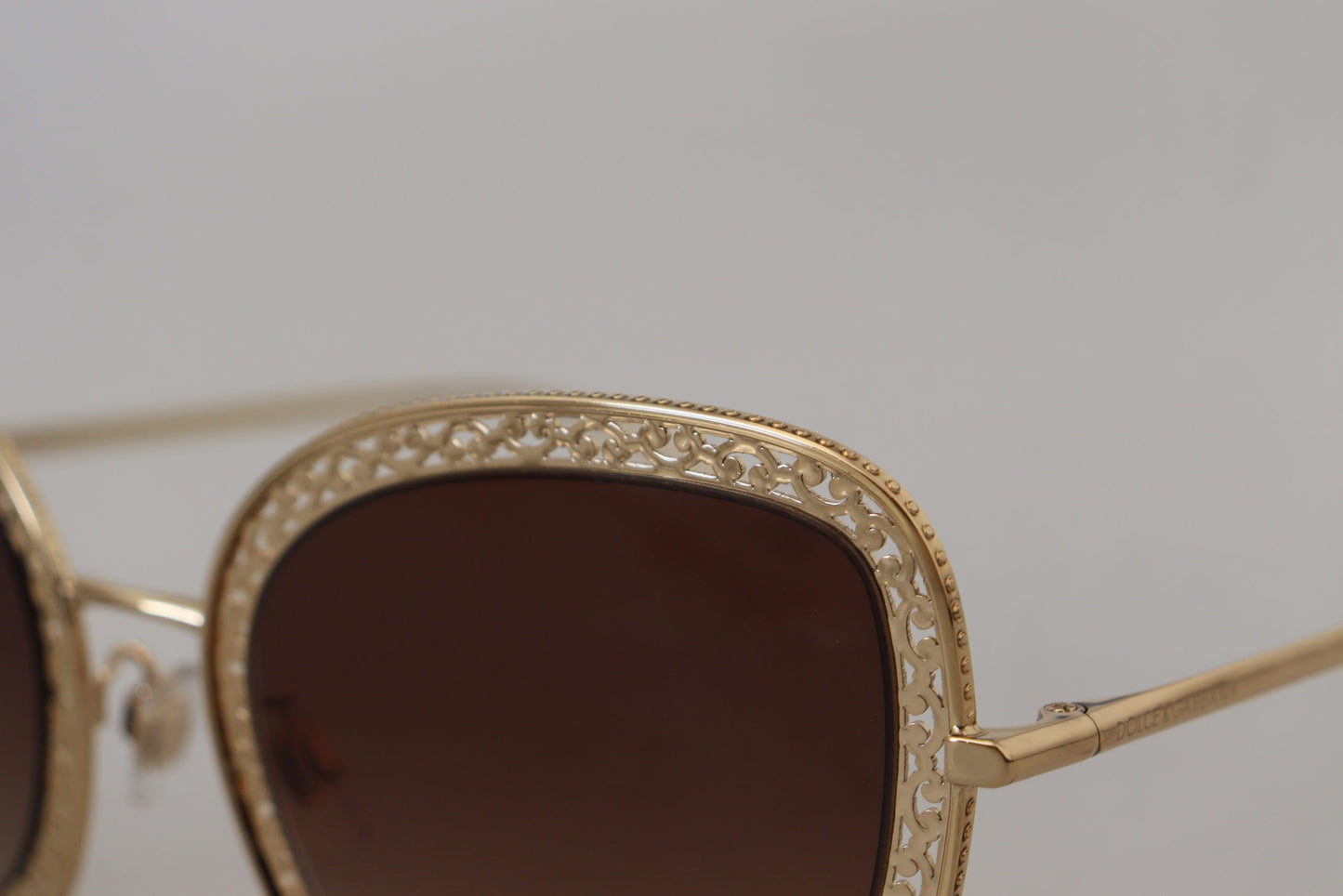 Elegant Lace-Patterned Gold Sunglasses