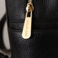 Chic Black Leather Backpack with Gold Accents