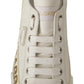 Elegant Gold Logo Leather Sneakers
