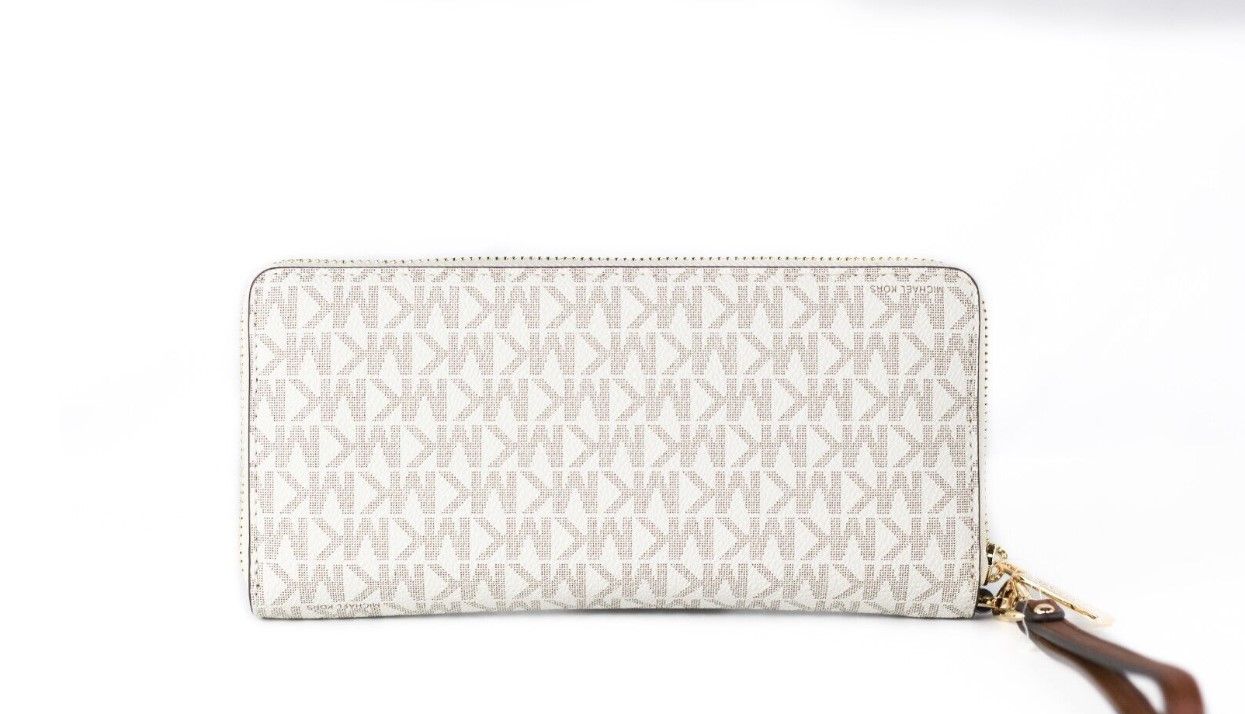 Jet Set Travel Large Vanilla Signature Continental Wristlet Wallet