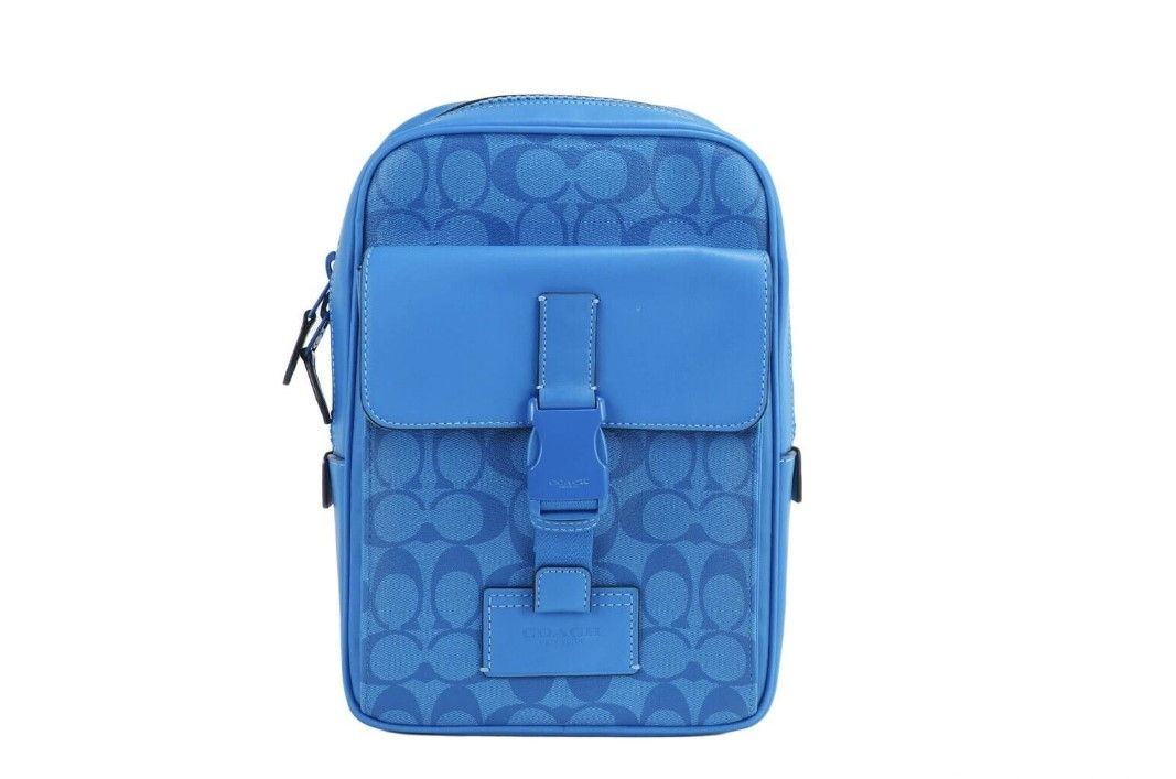 Blue. Track Backpack (C9838) Bright Blue Signature Coated Canvas Track Pack Slingpack Backp ...