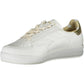 Chic White Lace-Up Sneakers with Contrasting Details