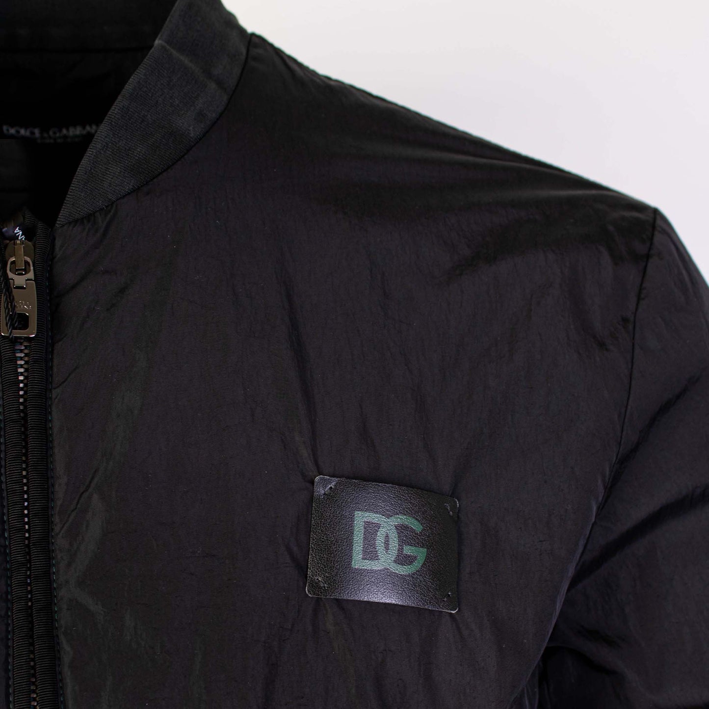 Sleek Black Bomber Jacket for the Dapper Gentleman