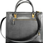 Elegant Black Polyurethane Handbag for Women