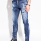 Cool Guy Distressed Tapered Jeans