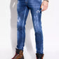 Cool Guy Distressed Tapered Jeans