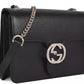 Elegant Black Leather Shoulder Bag with Silver Charm