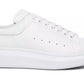 Elegant White Leather Lace-Up Sneakers with Oversized Sole
