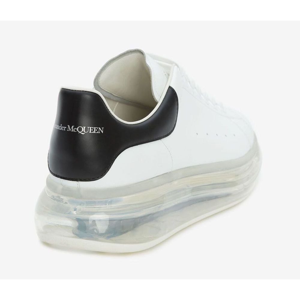 Sleek White Lace-Up Sneakers with Transparent Sole