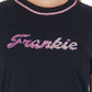 Chic Graphic Tee with Unique Appliqué Detail