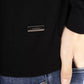 Sleek Black Turtleneck Monogram Sweater