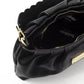 Elegant Black Leather Handbag with Golden Accents