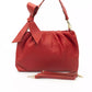 Elegant Red Leather Handbag with Golden Accents