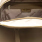 Elegant Beige Backpack with Golden Accents