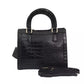 Elegant Black Shoulder Bag with Golden Accents