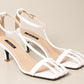 Elegant White Heeled Sandals