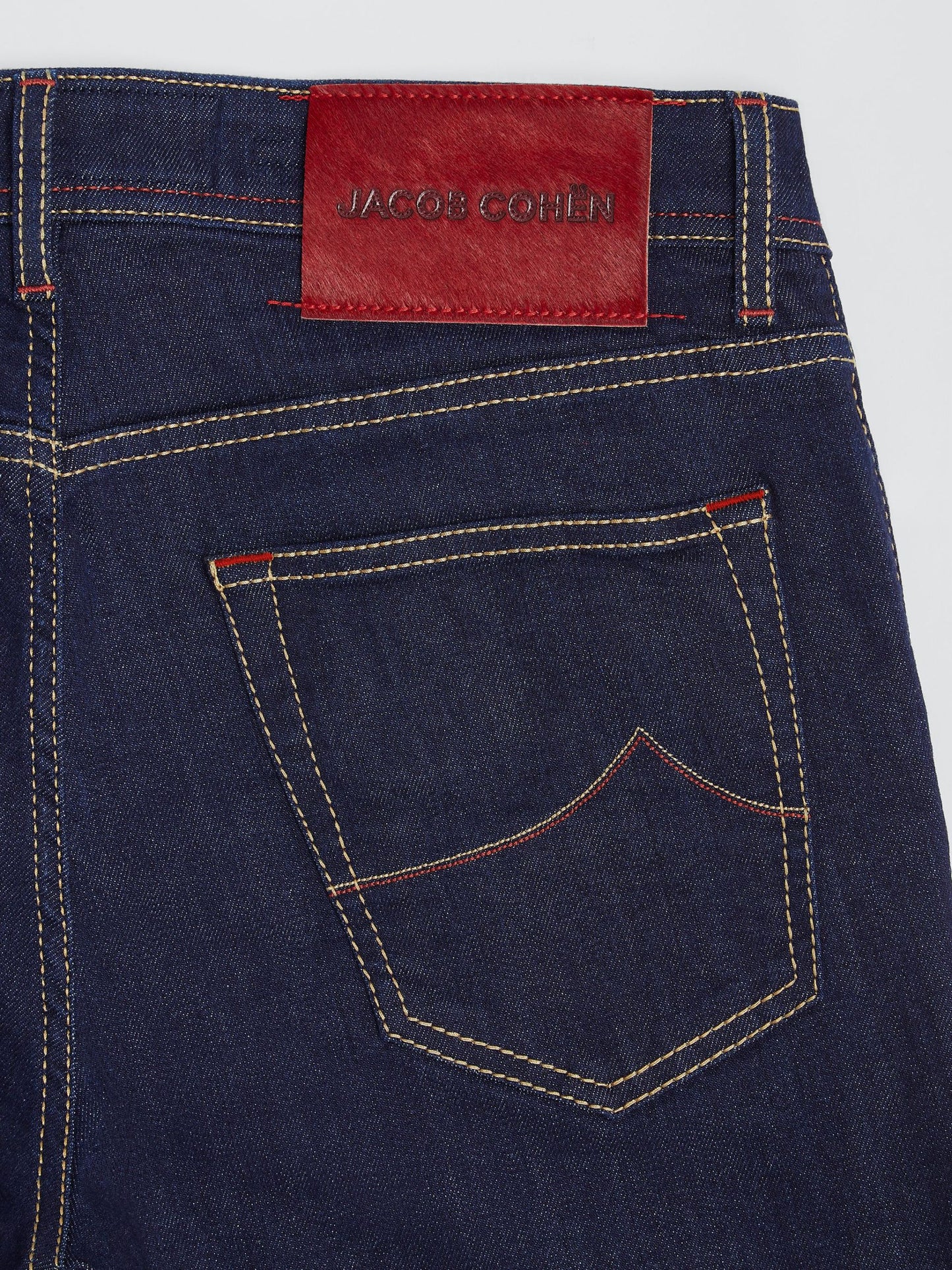 Elegant Slim Fit Handcrafted Jeans with Red Accents