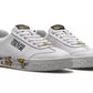 Elegant White Leather Sneakers with Exclusive Accents