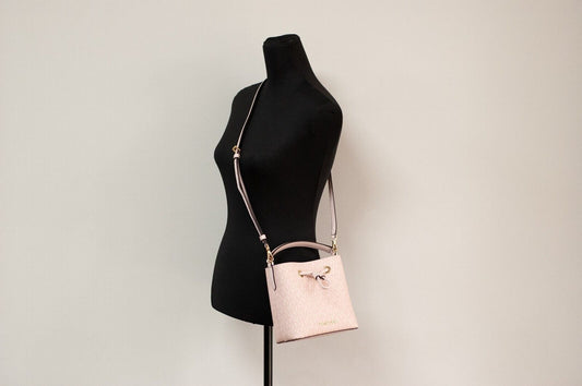 Suri Small Dark Powder Blush Signature PVC Bucket Crossbody Handbag