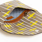 Elegant Striped Leather Clutch in Beige
