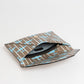 Elegant Crespo Clutch with Airplane Stripe Motif