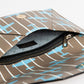 Elegant Crespo Clutch with Airplane Stripe Motif